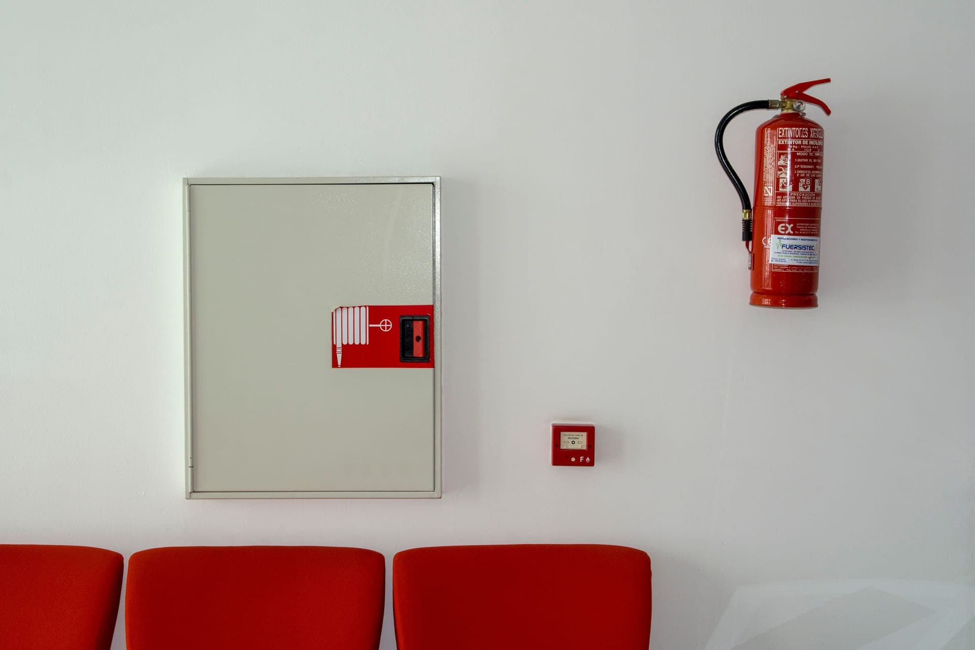 Illustrative photo of a fire blanket kit with gloves laid out on a kitchen counter